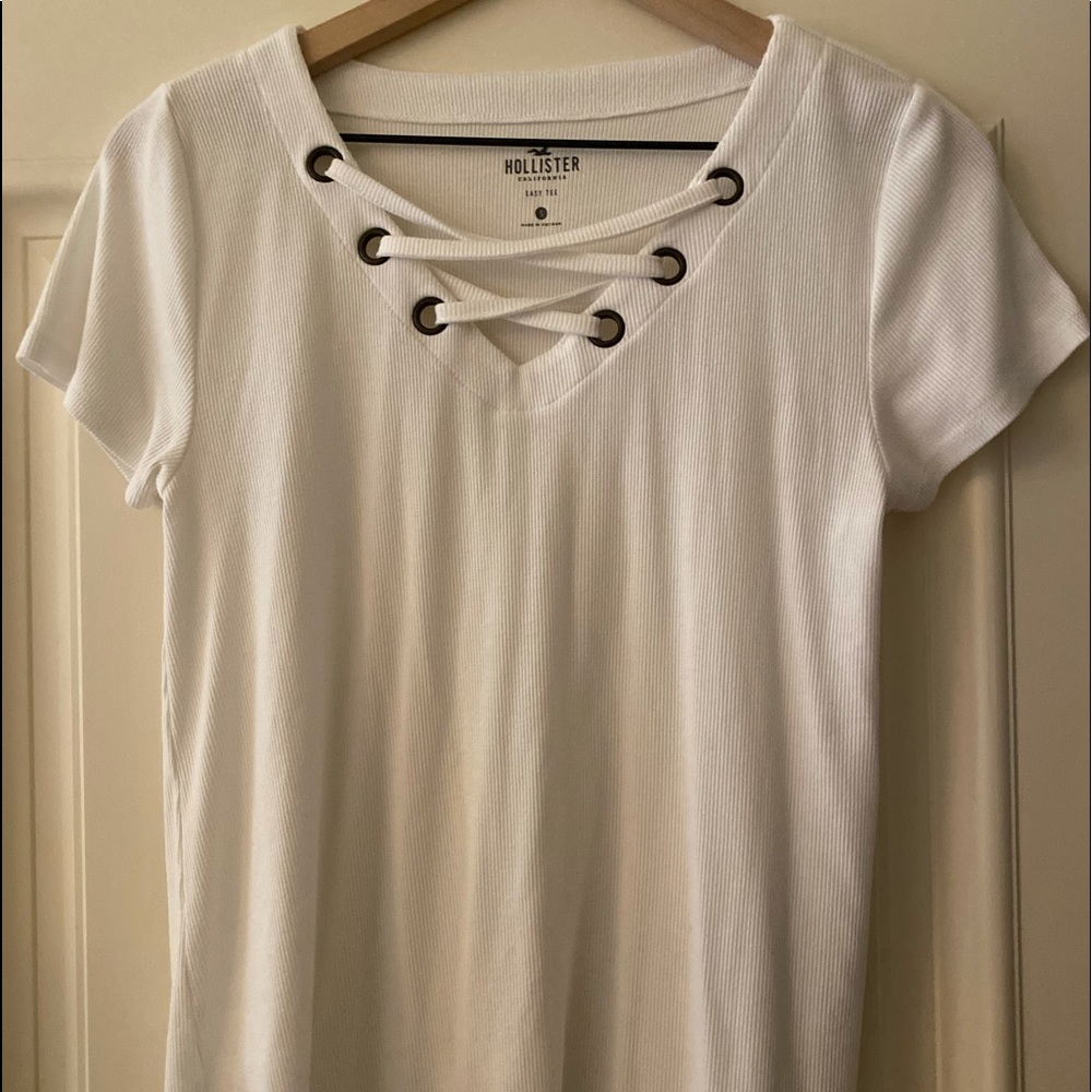 crossed white short sleeve shirt